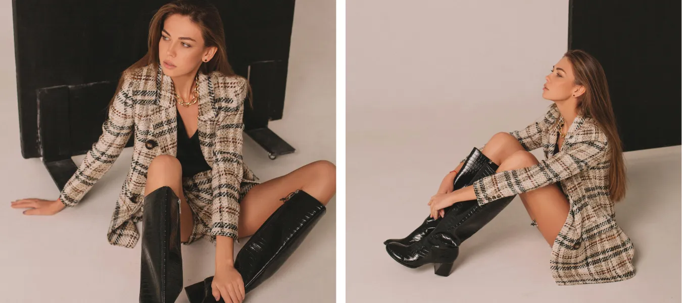 Stylizacja z marynarką w kratę i kozakami na słupku