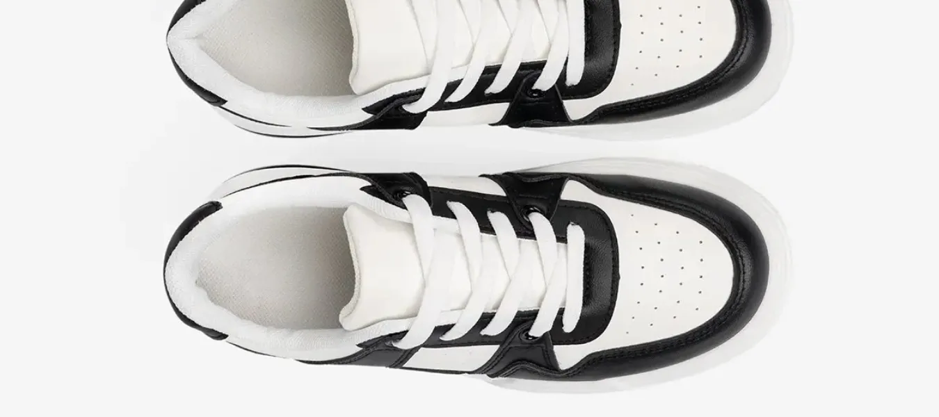 Czarno - białe sneakersy damskie - propozycja casualowego obuwia idealnego na jesień