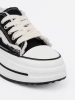 Women's black sneakers with white accents