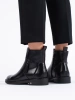 Sleek Black Ankle Boots by Potocki