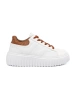 White sneakers with brown inserts