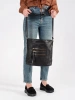 Black handbag with gold zippers