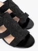 Black woven heeled sandals