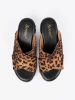 Suede women's wedge mules in leopard print
