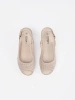 Beige cut-out wedge sandals