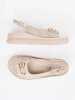 Flat sandals with taupe embellishment