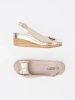 Gold low wedge sandals