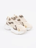 Beige animal print sneakers