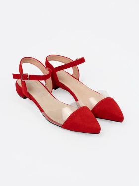 Elegant red sandals on a flat sole