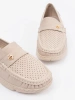 Light beige perforated loafers with a gold accent