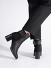 Chic Black Heeled Boots with Decorative Strap
