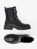Black lace-up worker boots with metal decoration