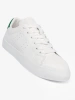 Classic white sneakers with a green accent