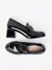 Patent leather loafers with silver decoration