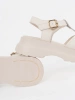 Light beige sandals with chunky sole