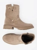 Beige suede ankle boots with decorative buckles