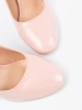 Pink patent pumps