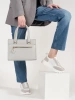 Gray boxy handbag with decorative zipper