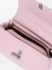 Small pink shoulder bag with a handle