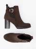 Dark brown ankle boots on a column heel with a decorative buckle