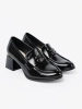 Patent leather loafers with silver decoration