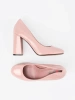 Pink patent block heel pumps