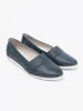 Navy blue moccasins with white sole