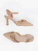 Beige slingback pumps
