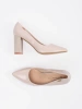 Beige patent block heel pumps