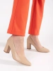 Beige block heel pumps