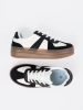 Black and white platform sneakers