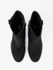 Black suede ankle boots on a column heel with ruched upper