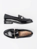 Black patent loafers with pearls