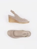 Beige cut-out wedge sandals