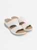 White comfortable slides with cutouts