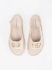 Beige sandals with embellishment