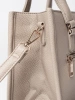 Beige satchel bag with decorative zipper