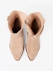 Beige women's ankle boots in a classic cut