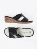 Black wedge mules with cutouts