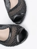 Black sandals with decorative mesh