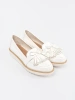 White Patent Loafers with Bow
