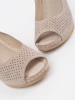 Beige cut-out wedge sandals