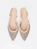 Light beige perforated low heel pumps