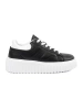 Women's black sneakers with white inserts