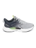 Gray sports shoes with a green element