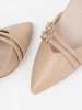 Beige slingback pumps