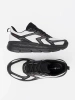 Comfortable White and Black Sports Shoes with Mesh Structure by McArthur