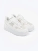 White women's lace sneakers