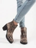 Heeled ankle boots in snake print