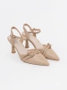 Beige slingback pumps